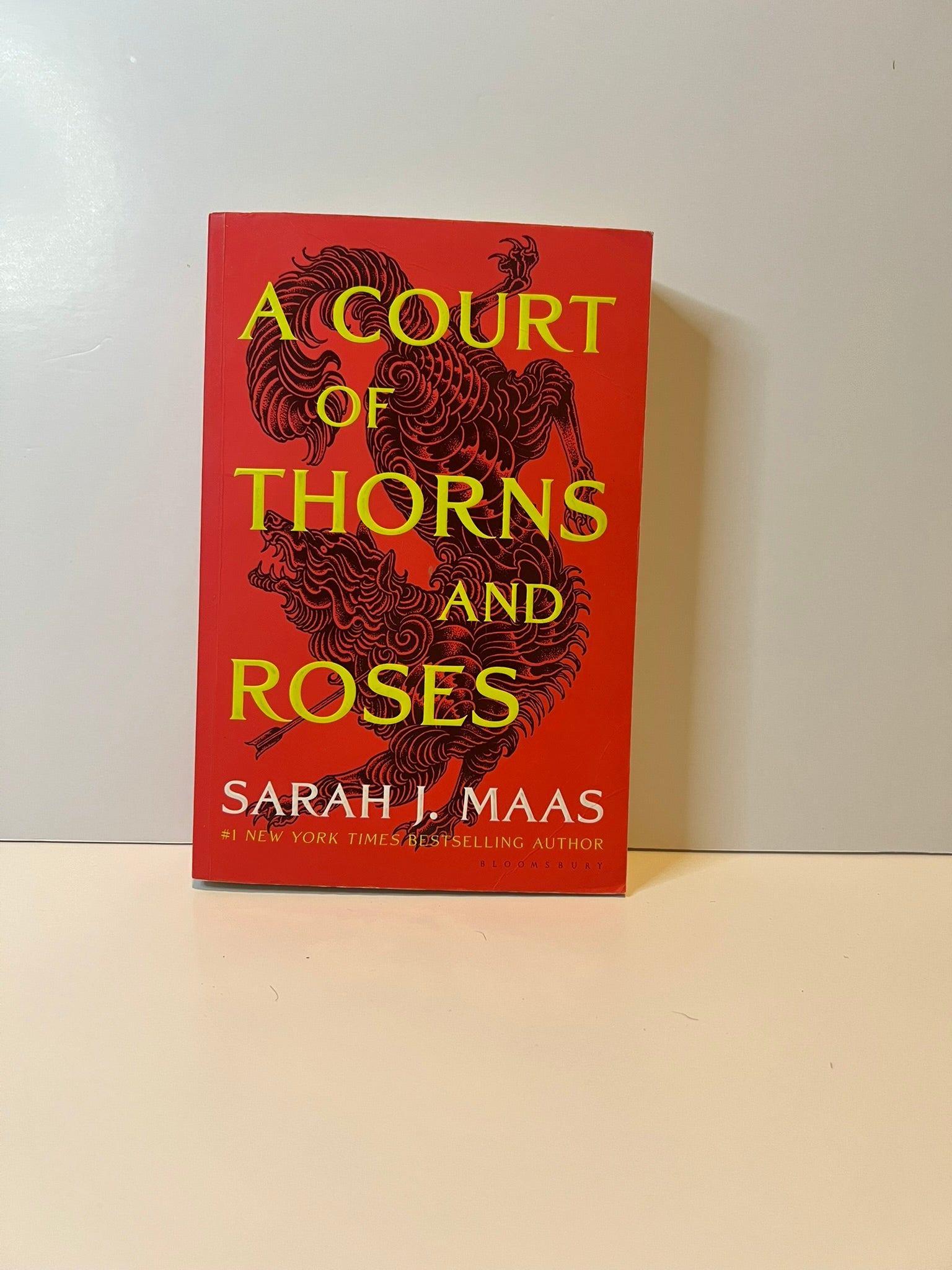 USED: A Court of Thorns and Roses