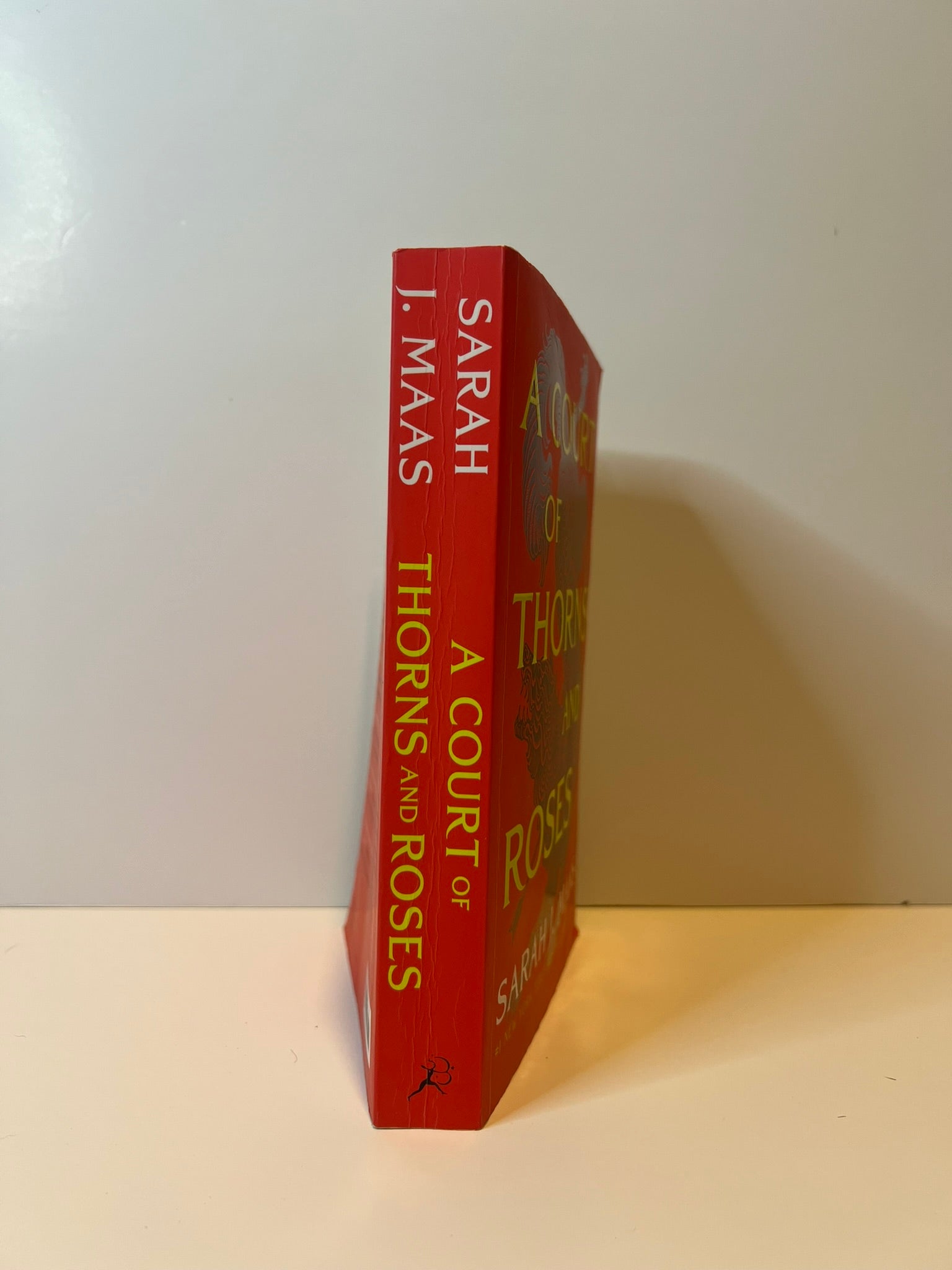 USED: A Court of Thorns and Roses