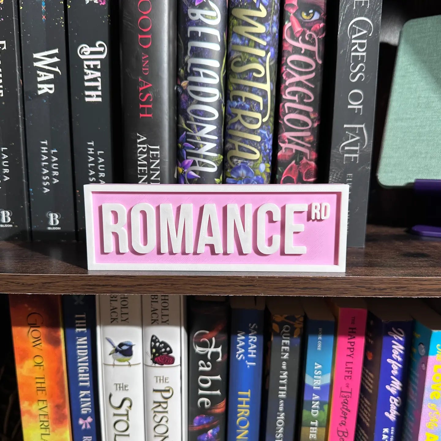 Romance Rd Shelf Sign